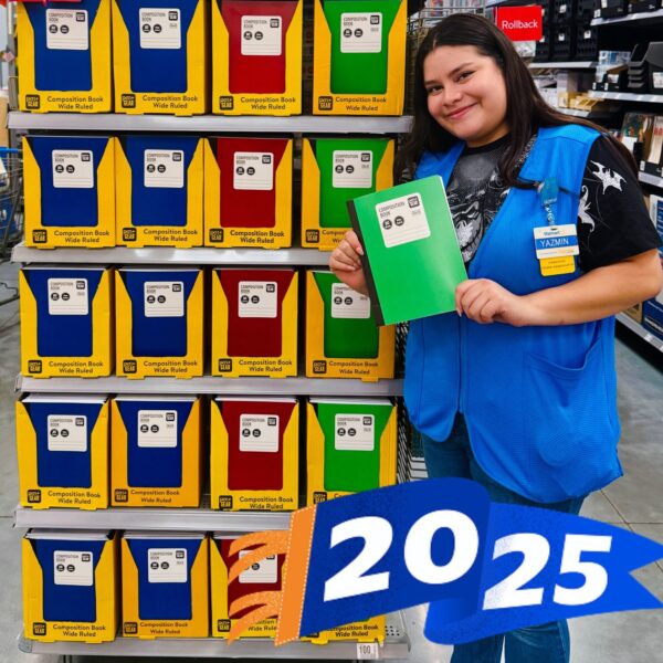 Walmart employee showing composition book